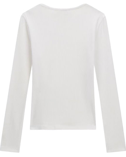 una maglia a maniche lunghe a coste di colore bianco Guess